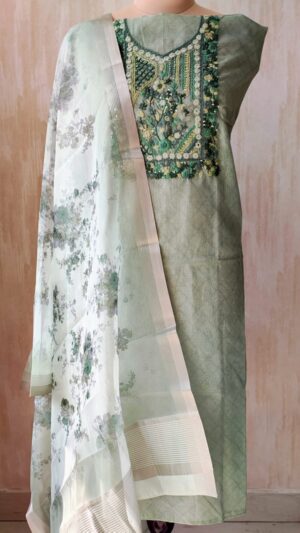 light green linen fabric with beautiful embroidery on neckline